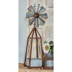 Cheap 🛒 Olivia & May 39" Farmhouse Windmill Inspired Iron Novelty Planter Brown - Olivia & May 👏
