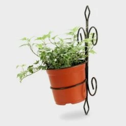 Cheapest ✔️ Iron Single Pot Novelty Wall Planter With Distressed Detail Black/Gold - Ore International ✨ -Planters Sales Store unnamed file 2897