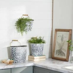 Buy 🛒 Olivia & May Set of 3 Metal Textured Patterned Planters with Metal Rim and Wood Handle Blue/Antique Gold - Olivia & May 🔔