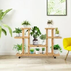 Brand new ❤️ Costway 4-Tier Wooden Plant Stand W/Wheels Multipurpose Storage Rack, Wood Grain Color ✨ -Planters Sales Store unnamed file 7783